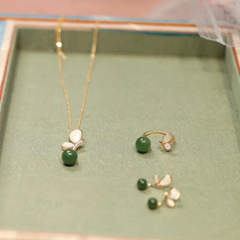 Ensemble de boucles d'oreilles et collier avec pendentif en Buddha Stones naturel en pierre de Tridacna en jade cyan plaqué or et cuivre