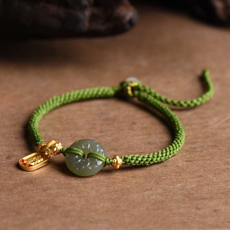 Bracelet en corde verte avec boucle de paix en jade vert et Buddha Stones