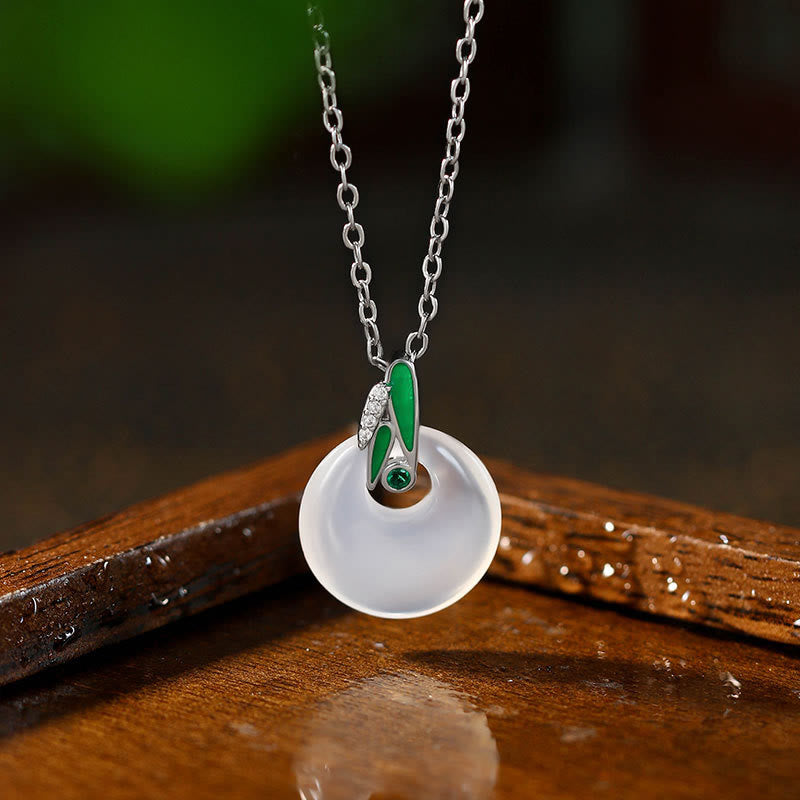 Buddha Stones en calcédoine naturelle et feuille de bambou avec boucle de paix et richesse