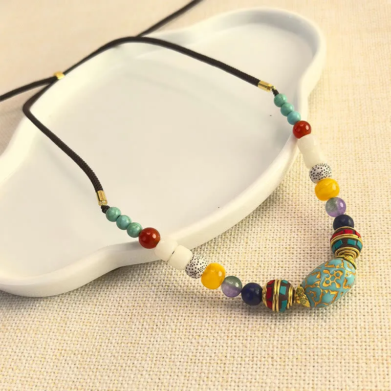 Collier pendentif en perles turquoises tibétaines faites à la main avec Buddha Stones