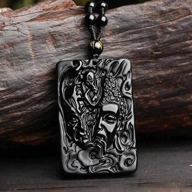Buddha Stones pendentif en obsidienne noire naturelle avec motif de diable et de Bouddha
