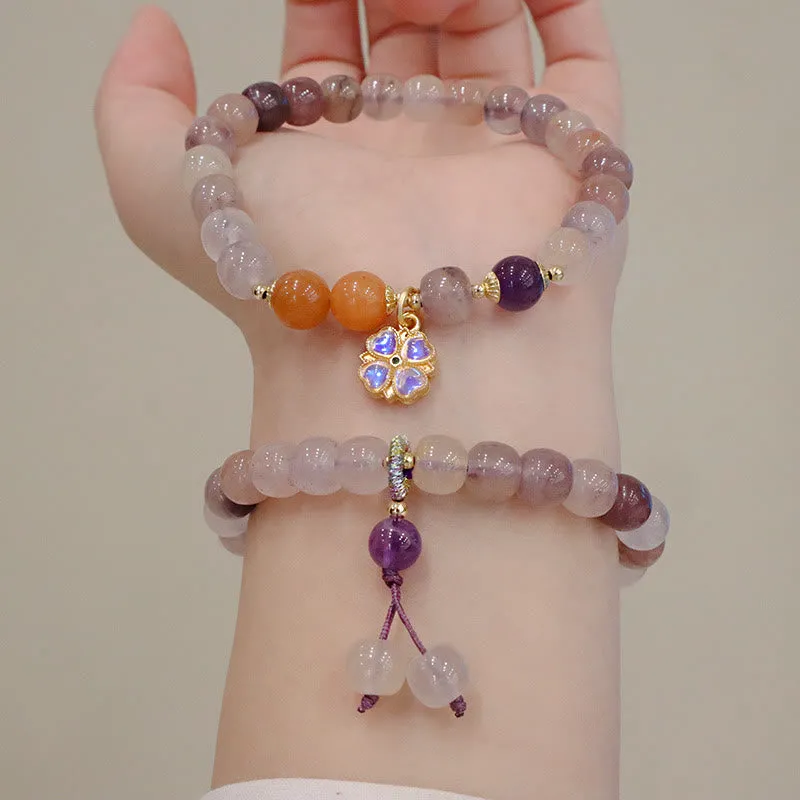 Bracelet de richesse en perles de jade violet doré en Buddha Stones