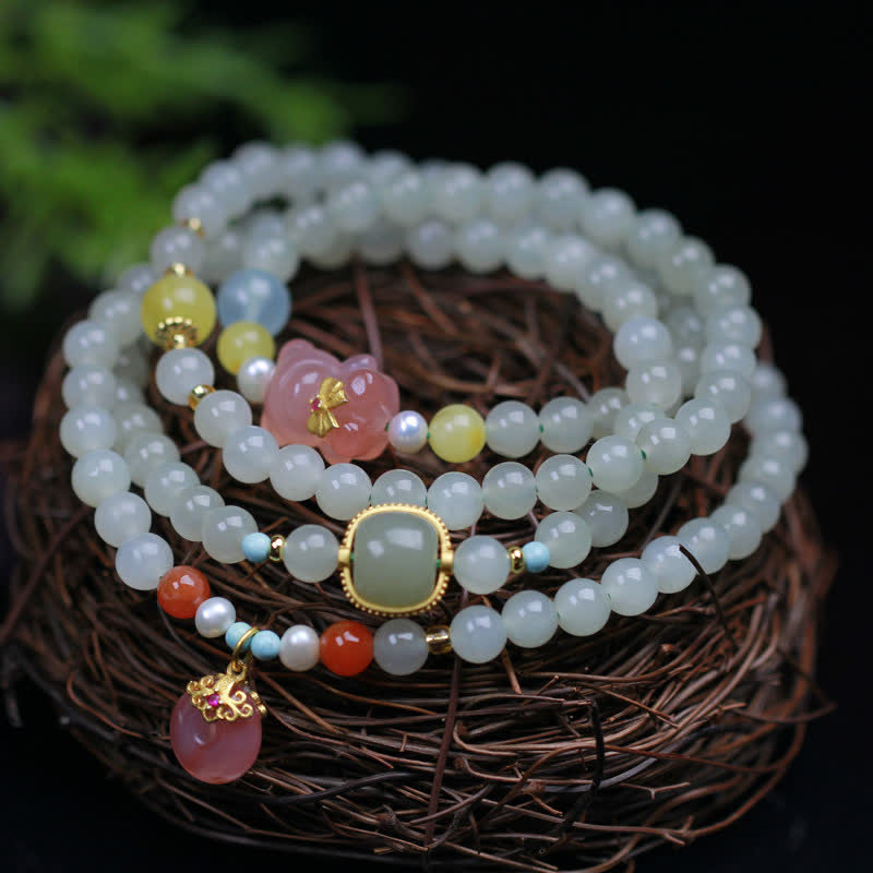 Bracelet en Buddha Stones en jade Hetian naturel avec cristal rose et boucle de paix pour le bonheur et l'abondance