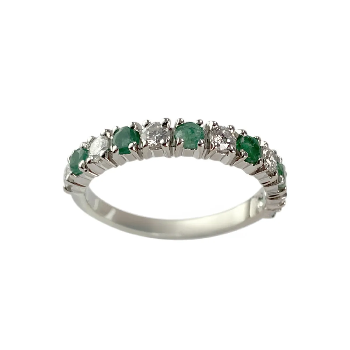 Bague d'occasion demi tour or 750 blanc diamants émeraudes