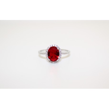Bague en argent 925 avec des zircons incorporé dans le blanc et le centre de la pierre de couleur rouge rubis