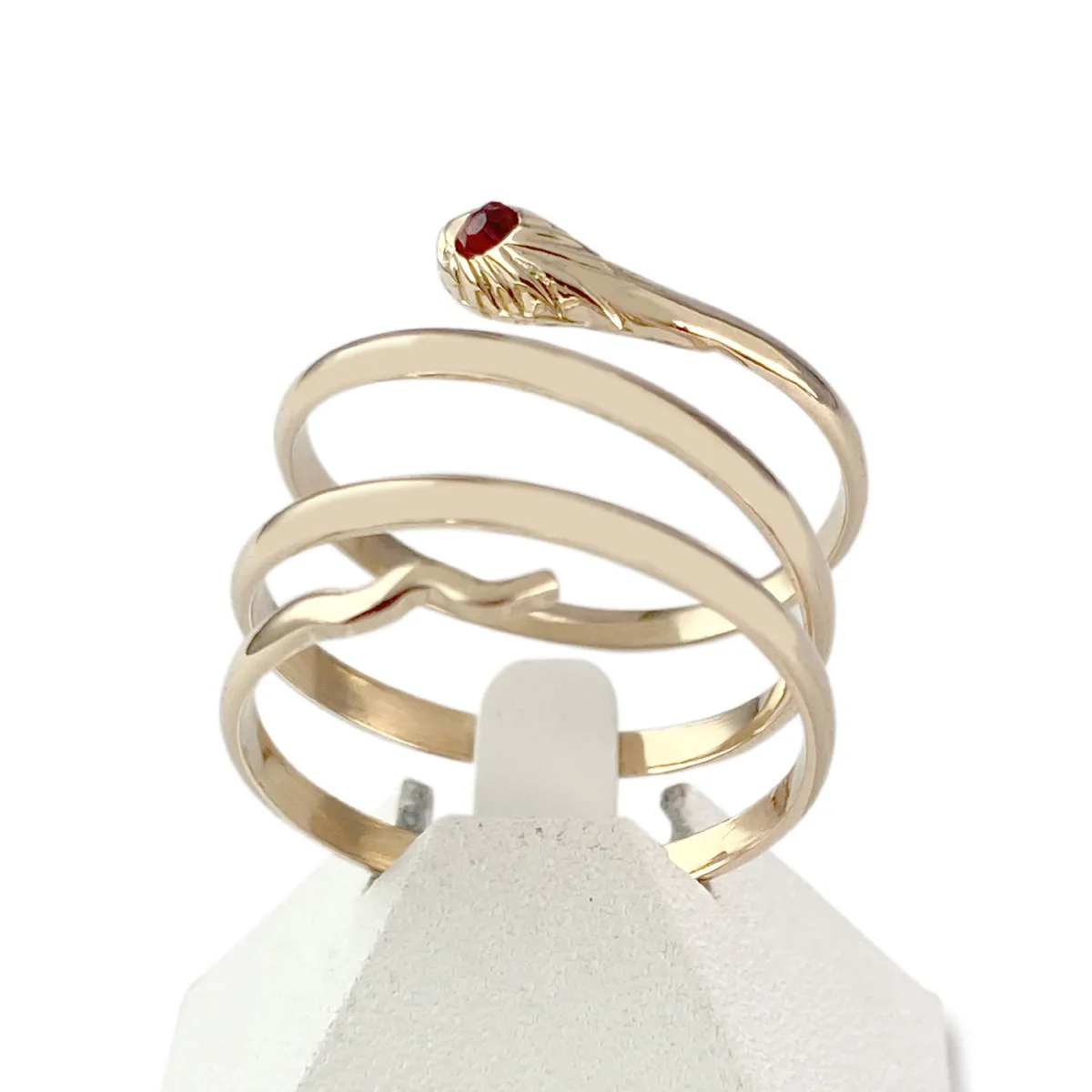 Bague serpent d'occasion or 750 rose pierre synthétique