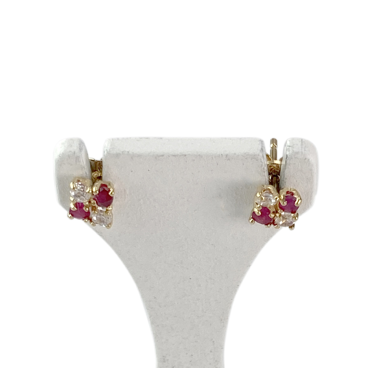 Boucles d'oreilles clous d'occasion or 750 jaune rubis zirconias