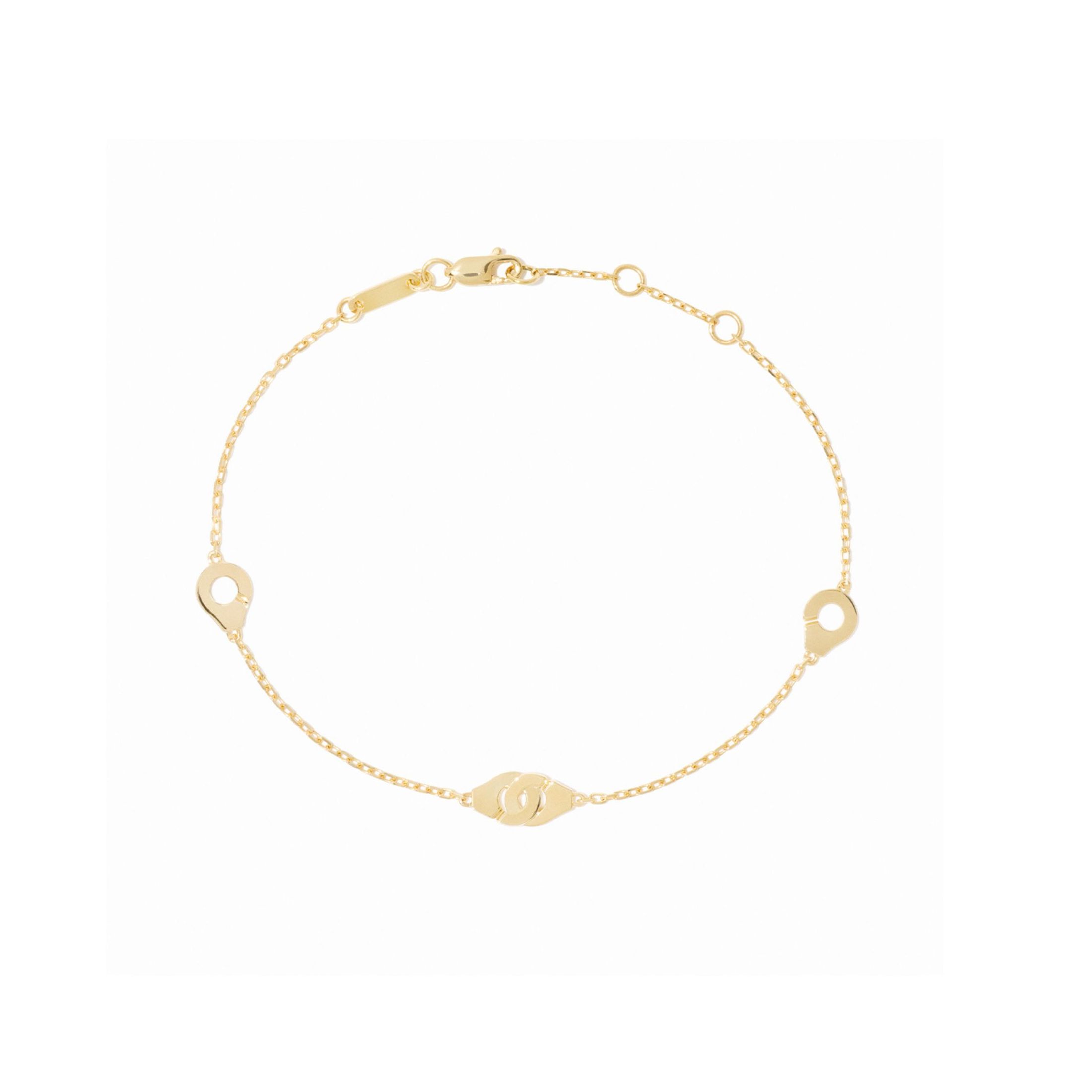 Bracelet Menottes dinh van R5 en or jaune sur chaine