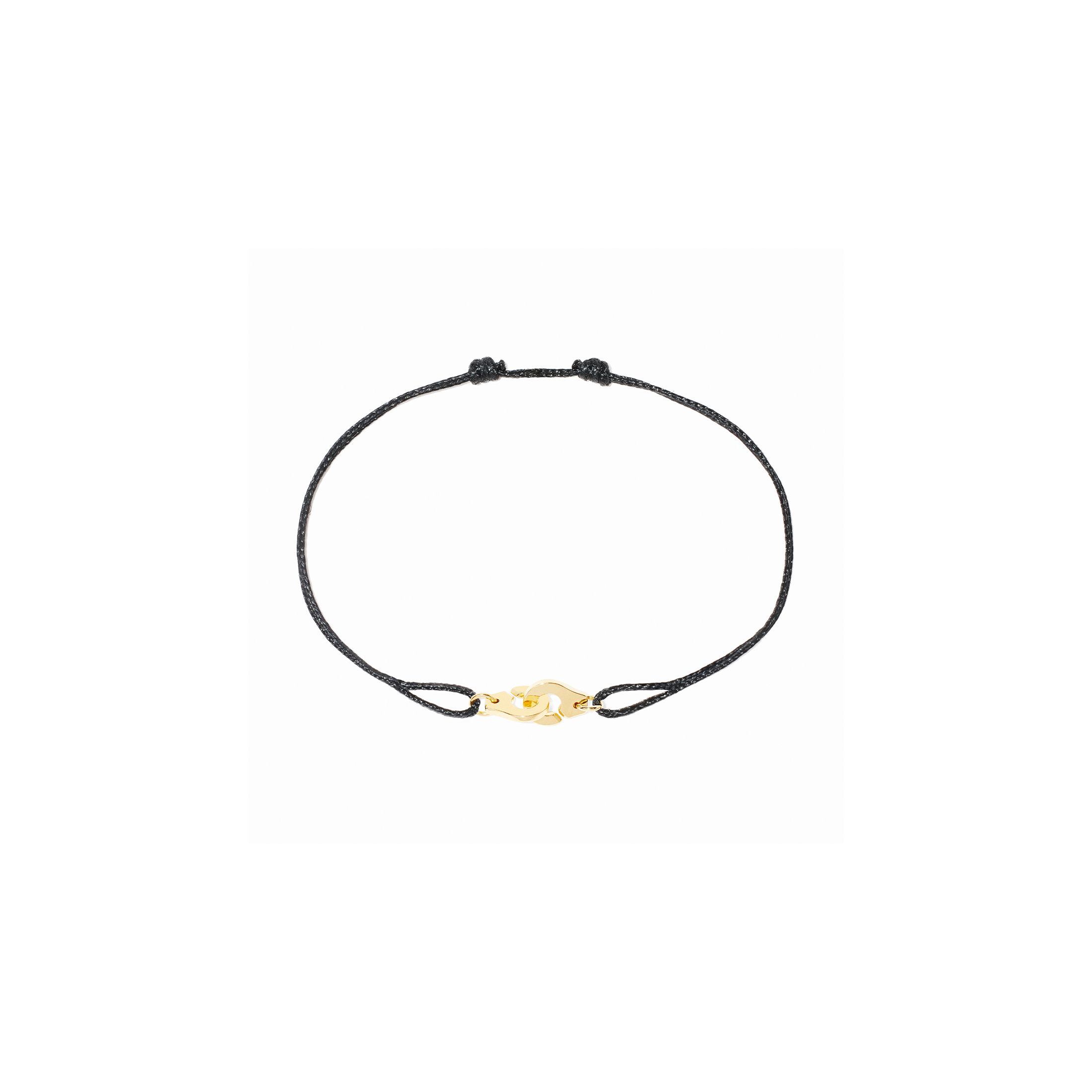 Bracelet Menottes dinh van R6,5 en or jaune sur cordon