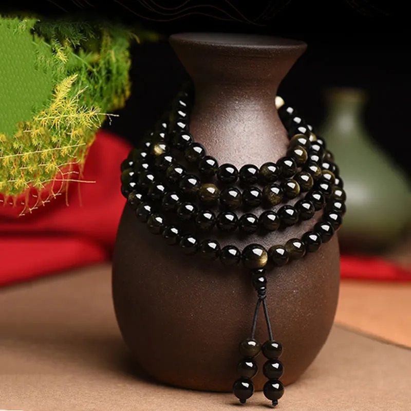 Bracelet de richesse en obsidienne naturelle dorée avec 108 perles de Mala Buddha Stones